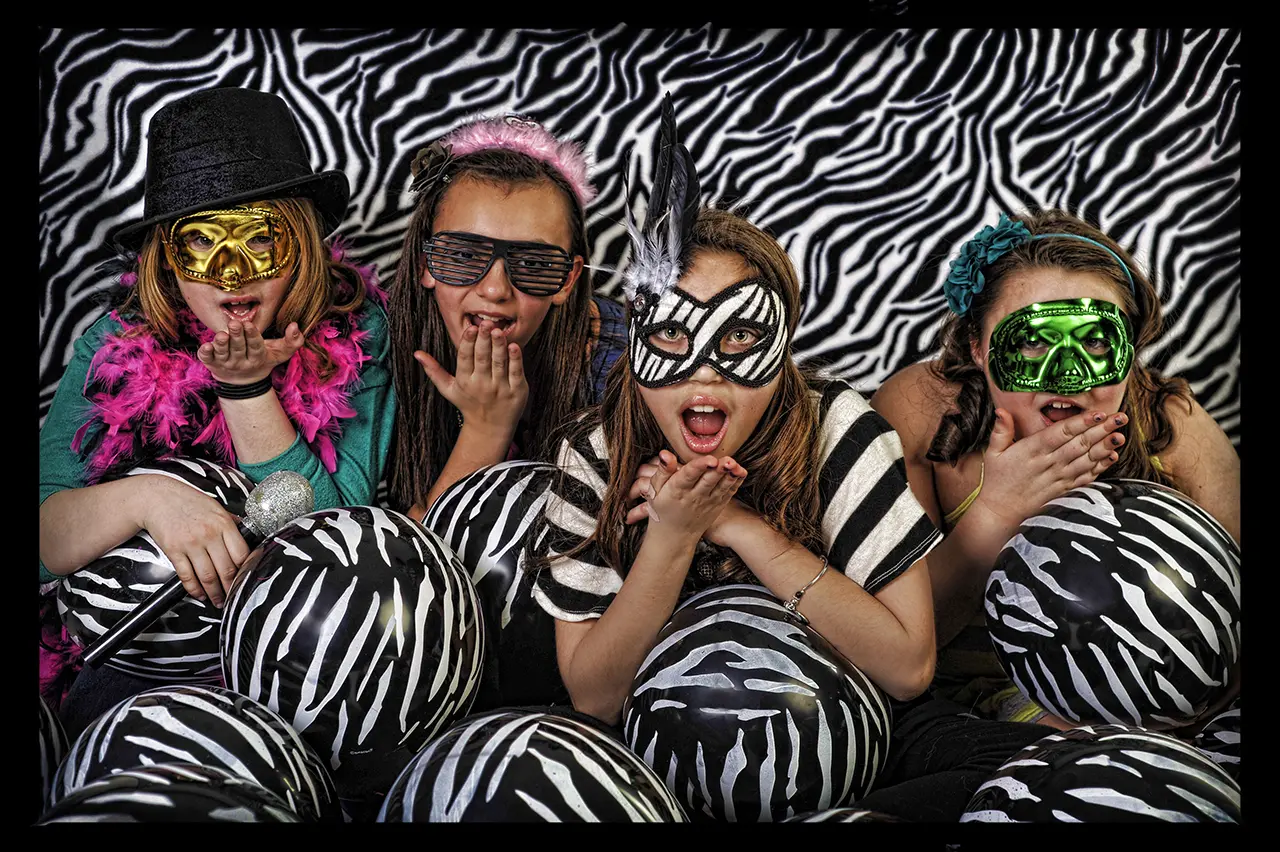 A group of people wearing masks and costumes.